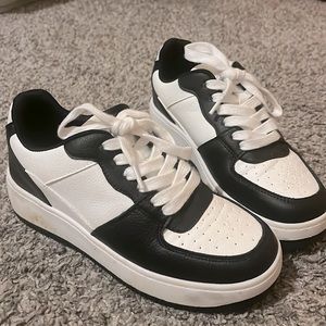 Black and white slightly worn women’s sneakers
